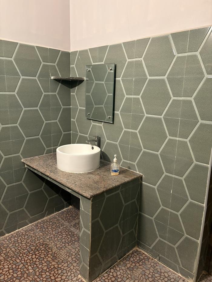 Attached bathroom with sink
