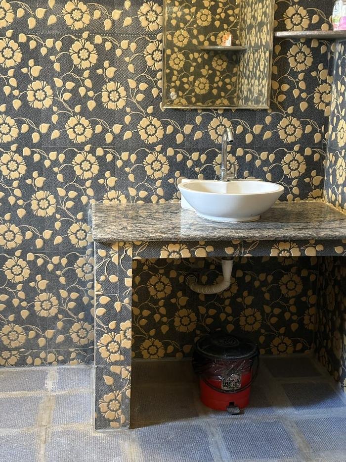 Attached bathroom with sink